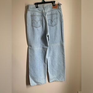 Levi’s wide, straight leg, full length jeans. Size 31